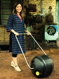 Cynthia Koenig with the Wello WaterWheel, an invention which that assists families in developing countries.