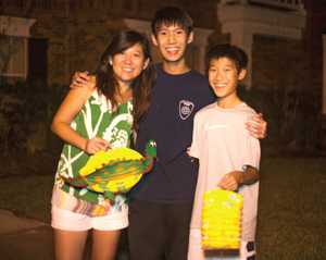 Judy Shin Lim with Shawn and Justin Lim ready to walk the neighborhood with their paper lanterns at this year’s Mid-Autumn Festival.