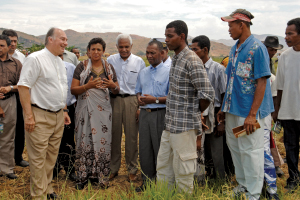 Rice farmers in Madagascar speaking with the Aga Khan in 2008. Ten thousand farmers are participating in an Aga Khan Foundation program that has seen their rice yields increase by as much as 600 percent, improving their standard of living.