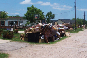 On Saturday, June 4th, Second Mile Mission went mobile to Rosenberg to serve flood affected families and help clean up neighborhood debris in partnership with a group of nonprofits, churches, businesses and organizations. Photo by Second Mile Mission.