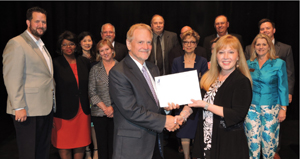 Fort Bend Education Foundation Past President Frank Petras presented a check to Fort Bend ISD Deputy Superintendent Dr. Christie Whitbeck with members of the Foundation’s Board of Directors Chris Hill, Pat Houck, Peggy Jackson, Lina Sabouni, Lynn Halford, Terri Wang, Ron Bailey, John Wantuch, Allan Holley, Dennis Halford, Dustin Fessler and Executive Director Brenna Cosby.